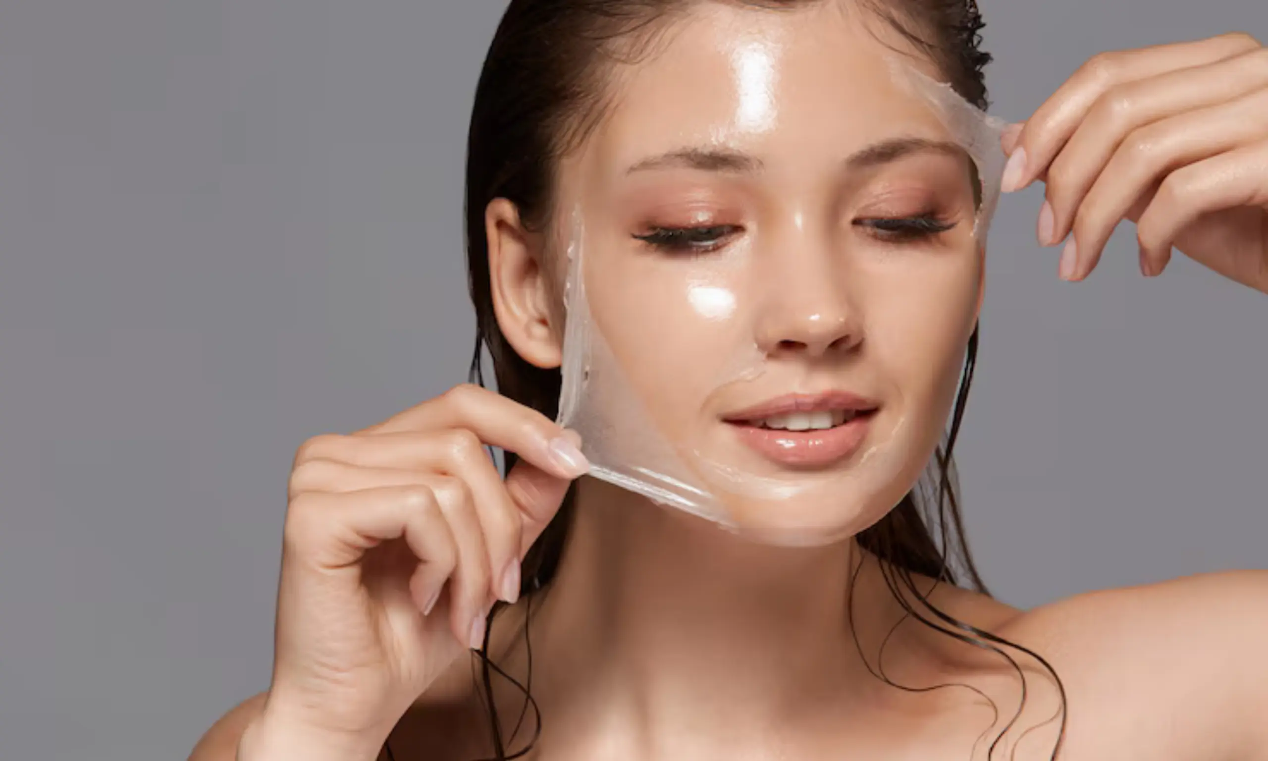 Woman peeling chemical peel on her face